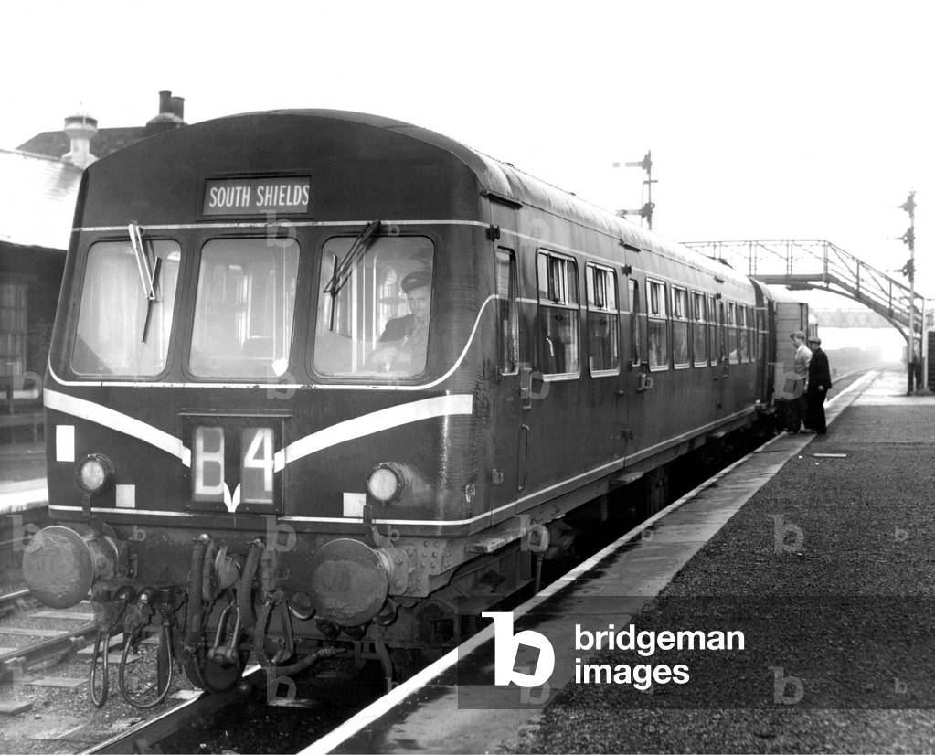 The last few passengers board the last train as it leaves Washington Station on 13th June 1963