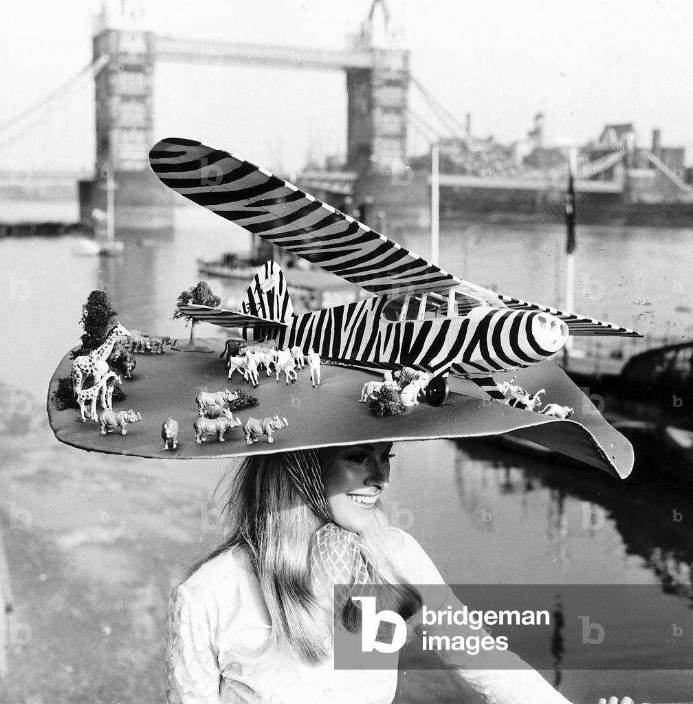 Carole Roddick with aircraft hat at Royal Ascot, June 1970 (b/w photo)