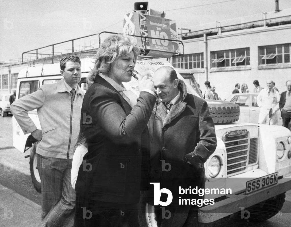 Unlikely lads, Jim Sillars (Labour), left Margo MacDonald (SNP) and Teddy Taylor (Conservative) at Glasgow Hillington Industrial Estae during an Anti Common Market rally 27th May 1975 (b/w photo)
