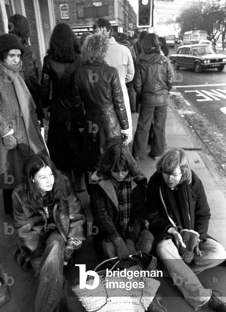 Elton John fans spent the night in sub-zero temperatures to make sure of getting tickets for the superstars concerts at Newcastle City Hall. 40 campers had taken their places on the steps in advances of Elton's March 22nd and 23rd gigs. 2nd February, 1979 (b/w photo)