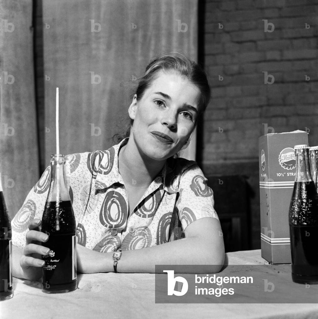 Television Presenters: Joan Aubrey and Bernard Lee seen here enjoying a Pepsi Cola, October 1953