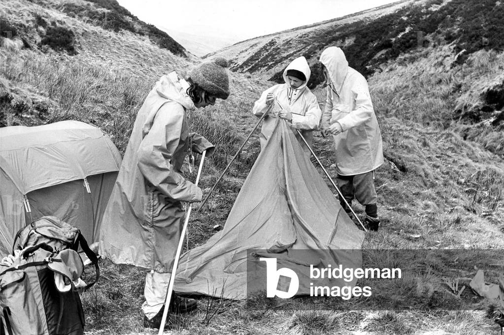 Some people learning which end of the tent is which on the Cheviots,c.1970