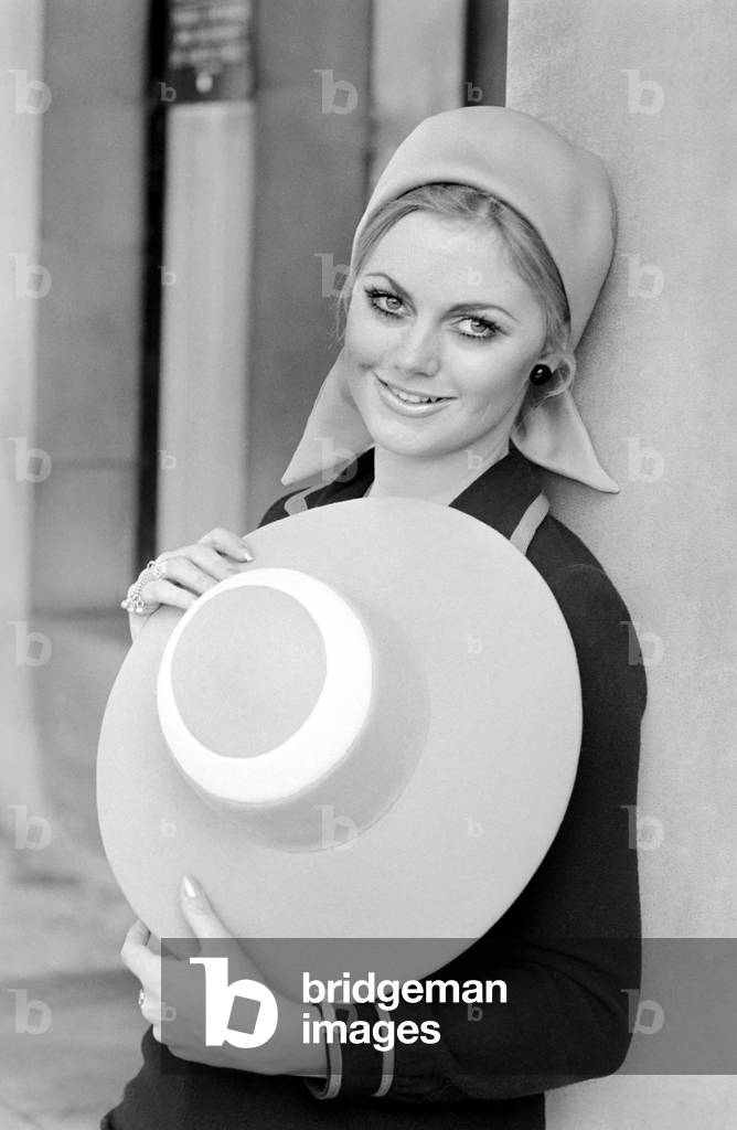 The Millinery Guild showed their Spring Collection of hats at the Dorchester, London. 
Geraldine Davies wearing a Sailor in Japonica and white felt, when the Sailor is removed the model reveals a head-hugging culotte in which is easy to lean back and rest - by McCracken and Bowen. 
November 1969