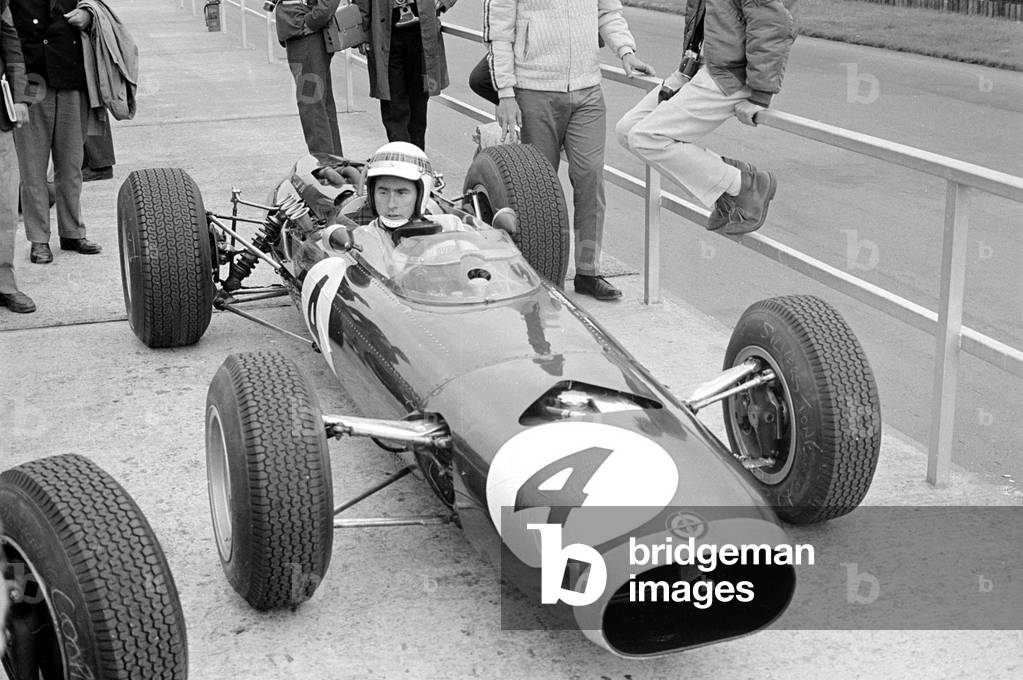 Silverstone Practice Day- Jackie Stewart in his Lotus, July 1965 (b/w photo)