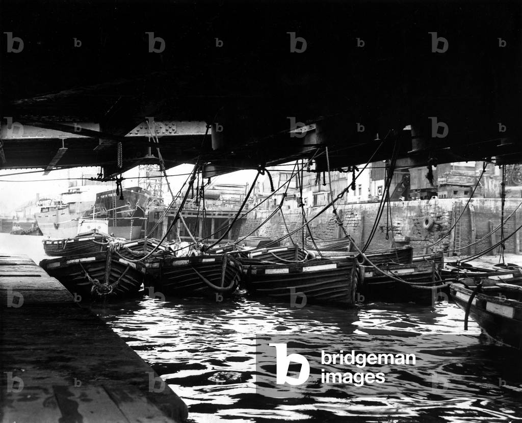 Idle foyboats at the South Shields ferry landing denote slack times and lean pickings for the Tyne's foyboatmen.
 29th April 1964.