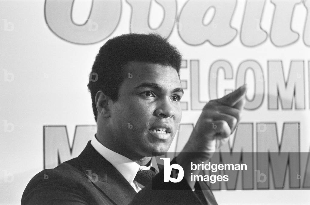 Muhammad Ali visits the co-op and Birmingham New Street railway station during his promotional tour for Ovaltine before hosting a press conference at the Albany Hotel. 13th October 1971 (b/w photo)