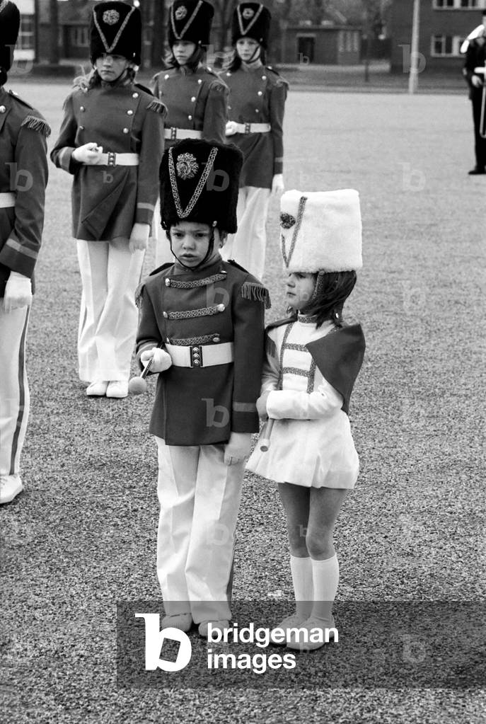 Passing Out Parade: 4 year old Joanne Cardy and 6 year old Kevin Hunt both from Brightlingsea, Essex, April 1977 (b/w photo)