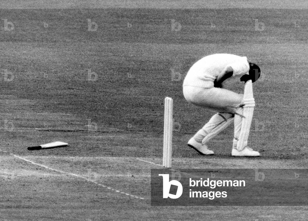 Tony Greig recieves a blow where it hurts from Australian fast bowler Dennis Lillee, 23rd June 1972 (b/w photo)