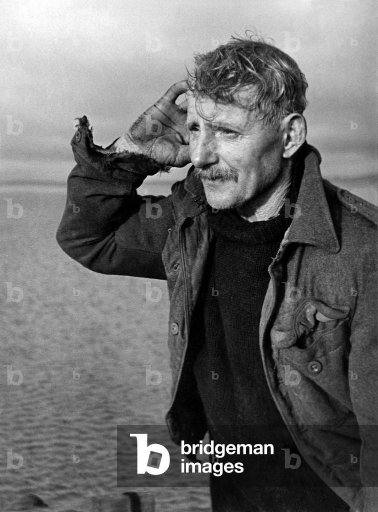 For sixty years, old Tom Wilson has been listening to cockles singing on the sandbanks of Morecambe Bay, 
December 1947