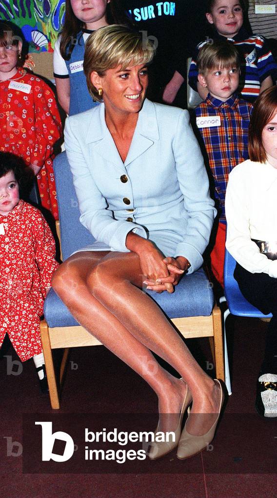 Princess Diana at Brompton Hospital where she was there to highlight the fact that it was cystic fibrosis week. She looked tanned as she had just returned from a holiday in Barbuda she is pictured wearing a powder blue Versace suit April 1997