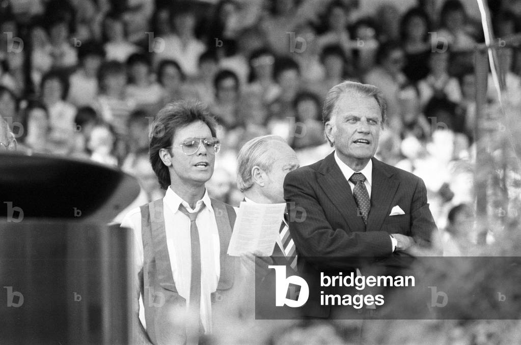 Billy Graham, American Christian evangelist, Mission England Crusade, Villa Park, Birmingham, 6th July 1984 (b/w photo)