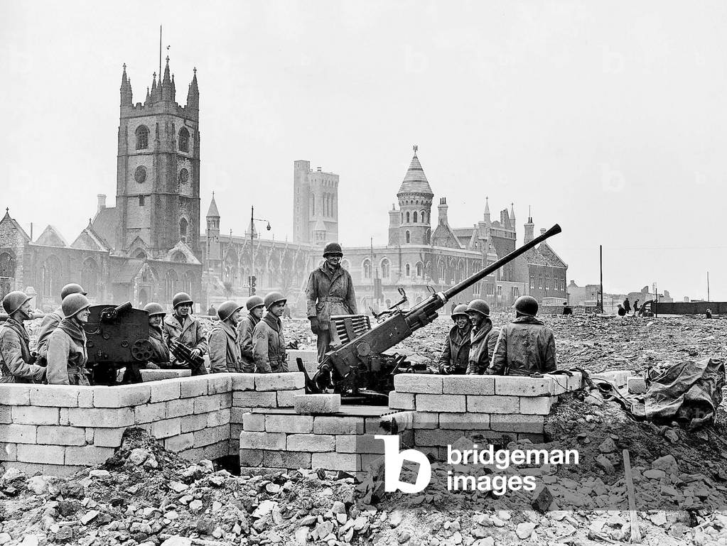 American soldiers man an ack ack gun in Plymouth part of the defence against air raids on the city and naval base. WW2 1944 (b/w photo)