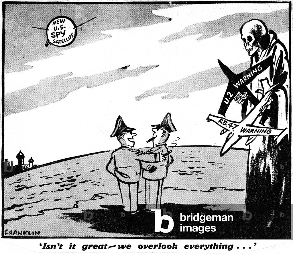 Its great we overlook everything ' Two American Generals pat themselves on the back as they look up at the new US Spy satellite. Behind them is death holds two aircraft bearing the words U2 Warning and B47 Warning. Franklin Cartoon 15th November 1960 (b/w photo)
