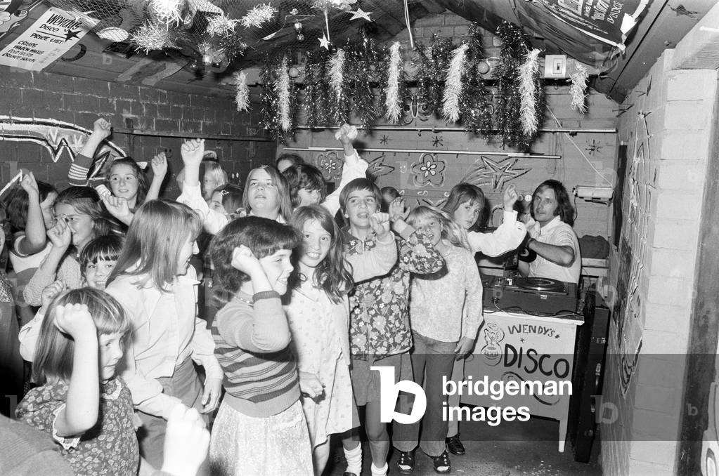 Pete Waterman, DJ at Garage disco in Coundon, Coventry. 7th August 1973 (b/w photo)