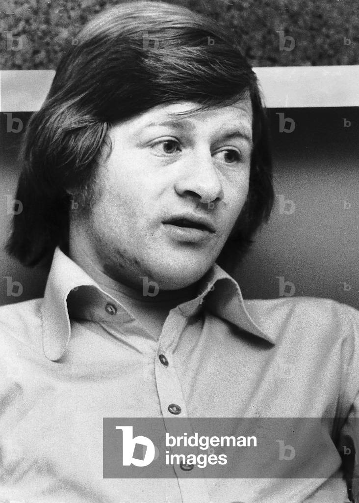 Alex Higgins snooker player in his managers office, April 1973 (b/w photo)