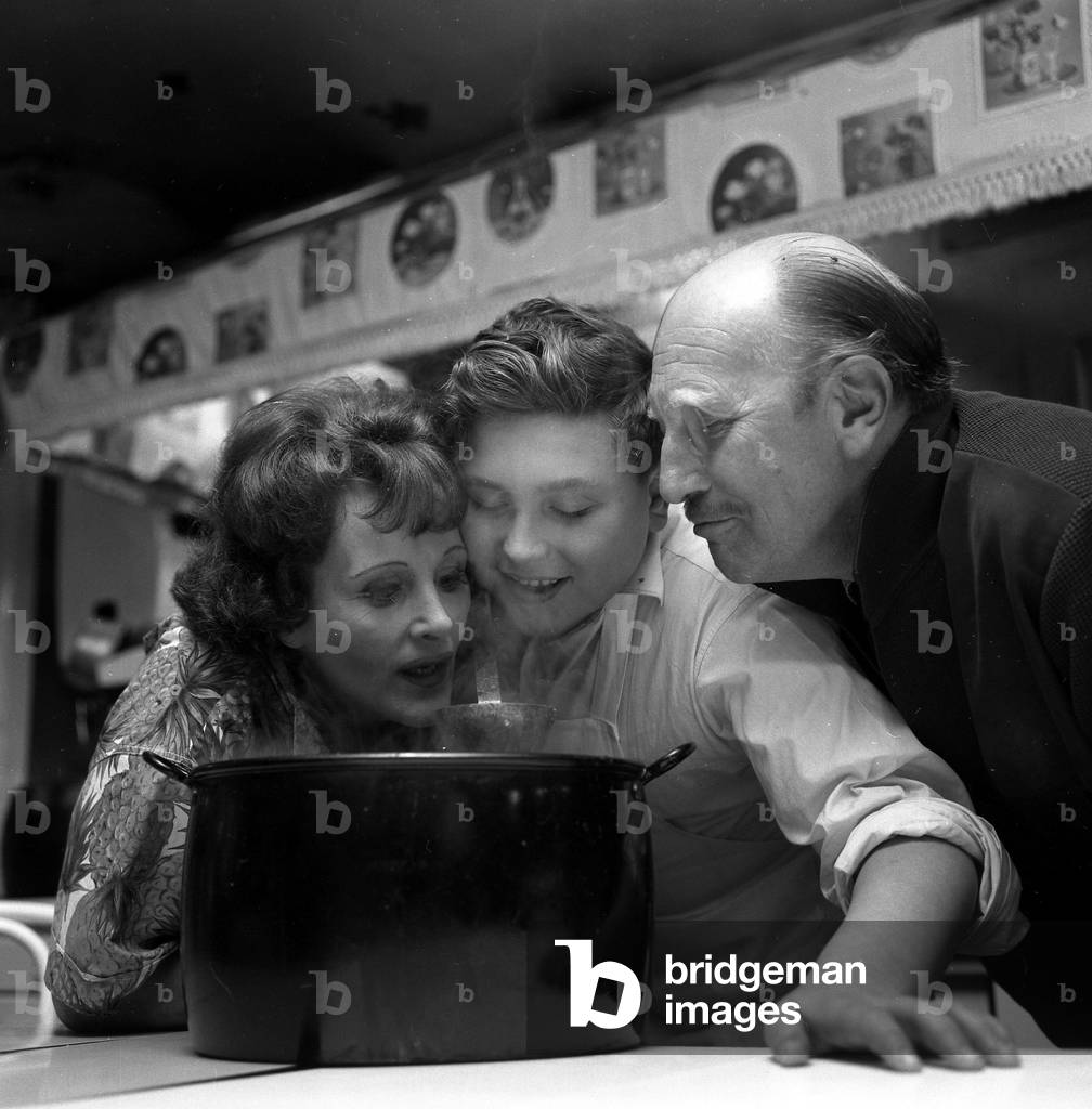 Fanny Craddock's Kitchen Right Johnny Craddock with pupil cook John Harper seen here with TV cook Fanny Craddock, tasting her latest creation October 1962 (b/w photo)