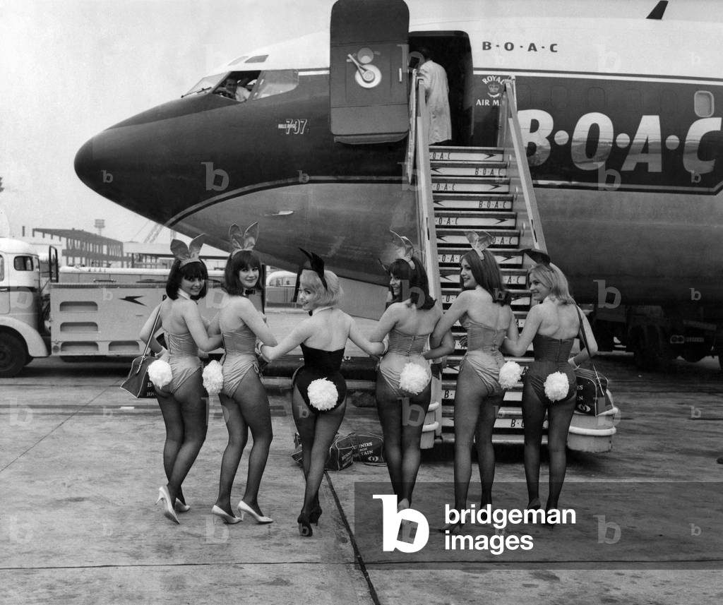 Six British bunny girls leaving London Airport for Chicago where they start a 4 month tour, October 1965 (b/w photo)