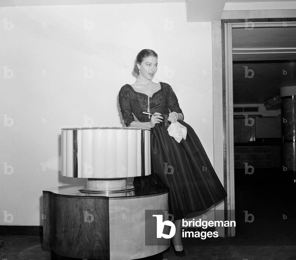 Ava Gardner at a press reception in London, December 1954