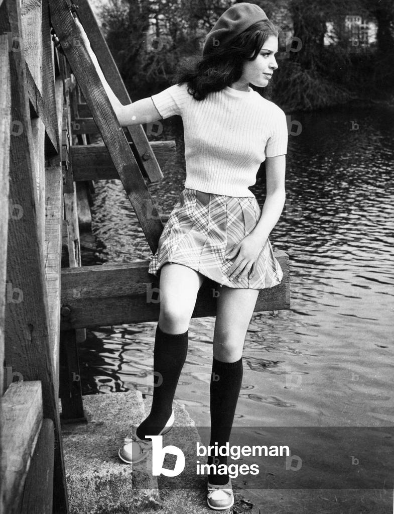 A model poses in socks by Twiggy and a Mary Quant Beret