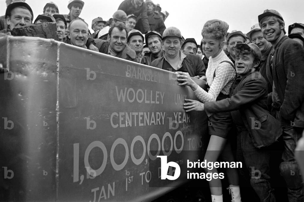 Donna Douglas (black coat) who is appearing in 