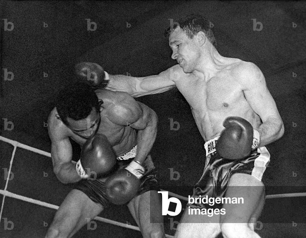 Dave Charnley, right, during his fight with the Frenchman Fernand Nollet. February 1961