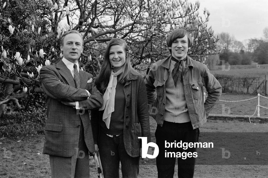 Filming of the final episode of the second series of the television programme Callan, starring Edward Woodward. Picture shows: Edward Woodward with his son Tim (right) and Sarah Liddell, daughter of Alvar. 20th April 1969 (b/w photo)