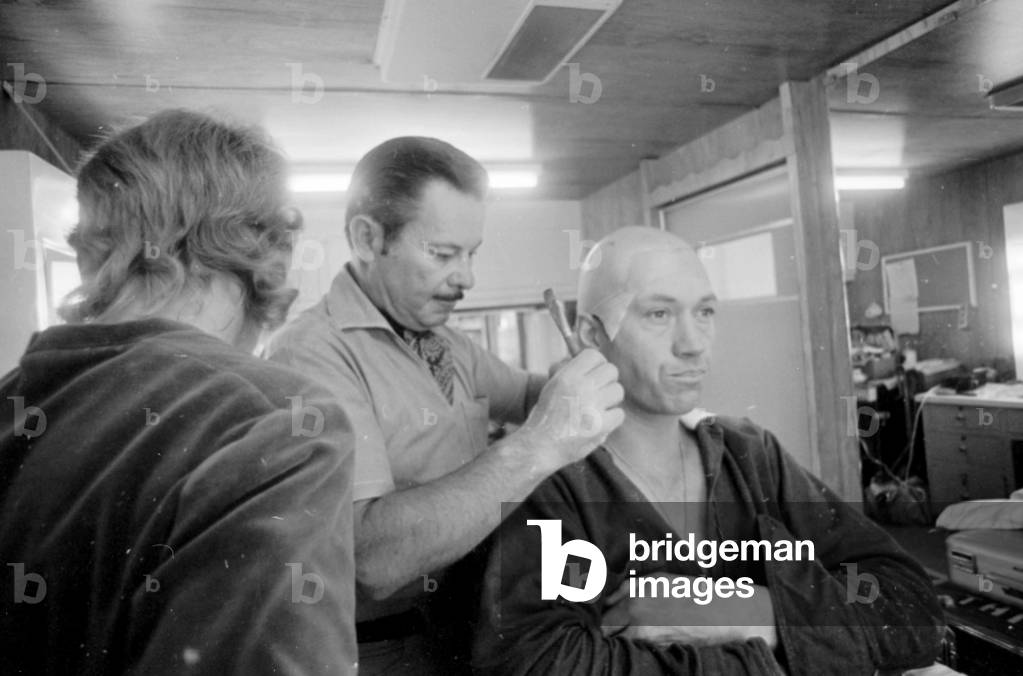 David Carradine actor has his makeup applied on set of TV programme Kung Fu (1972-1975), pictured November 1973 (b/w photo)