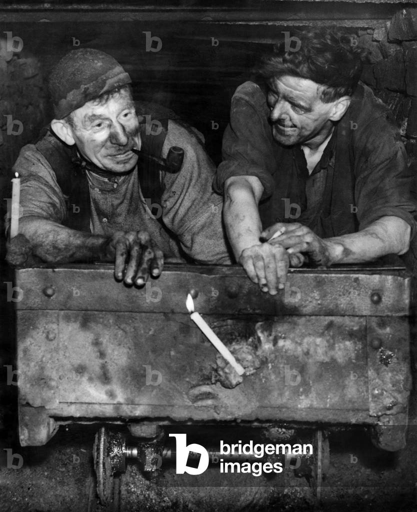 Coal miners at Rochdale pit on a mine cart. October 1947 P018219