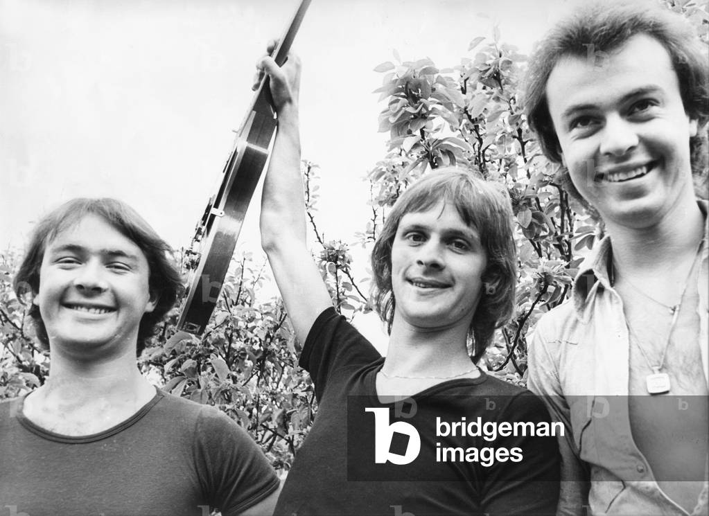 Tyneside rock group Goldie celebrate their first record 'Making Up Again' entering the top 30 singles chart. 
Dave Black (centre) co-wrote the song with singer Pete McDonald. 07/06/1978