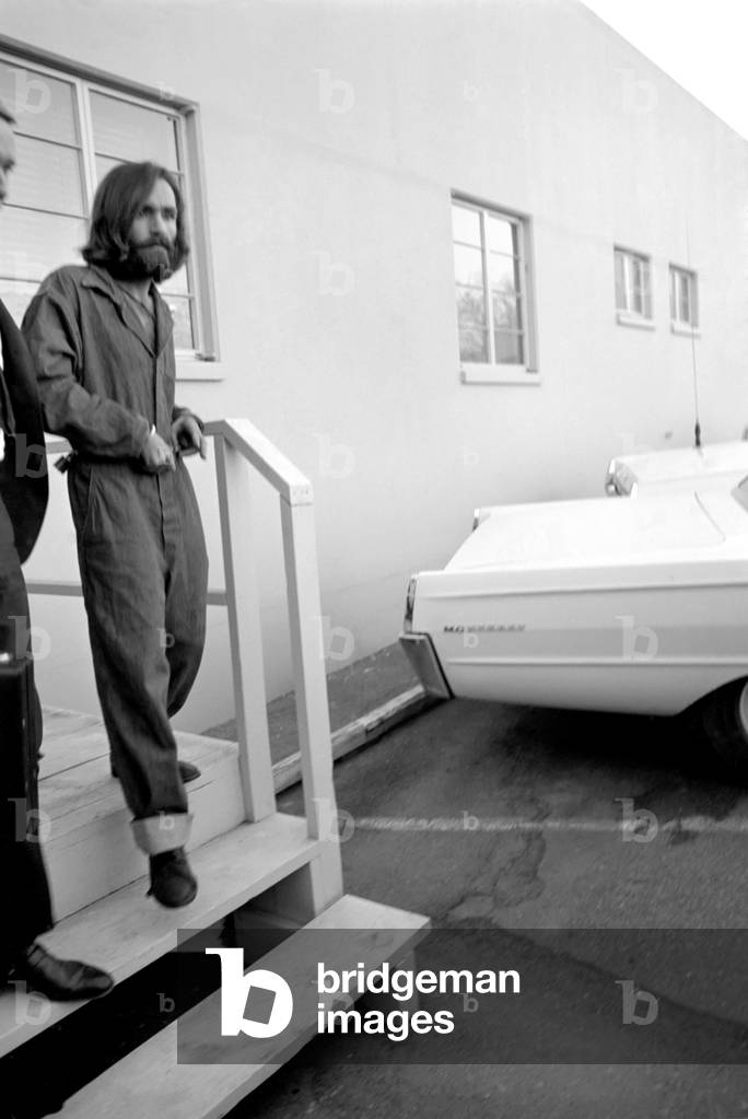 Accused murderer being led to and from court house in Inyo County, California.He is Charles Miller Manson, aged 34 years, 5th December, 1969