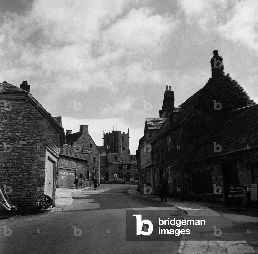 Corfe Castle village, Dorset. Circa 1952 (b/w photo)