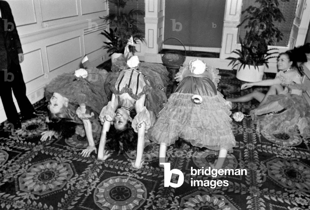 Can-Can Dancers: Table Decorations: Due to the Mild winter we are enjoying new Cauliflower from Brittany is reaching this country 5 weeks early. Four Can-Can dancers Biba Brookman, Diana Regal, Robbie Hart and Nicky Billiyard introduced the delicious vegetable is a spirited Can Can which they call the Cauli Can Can. January 1975