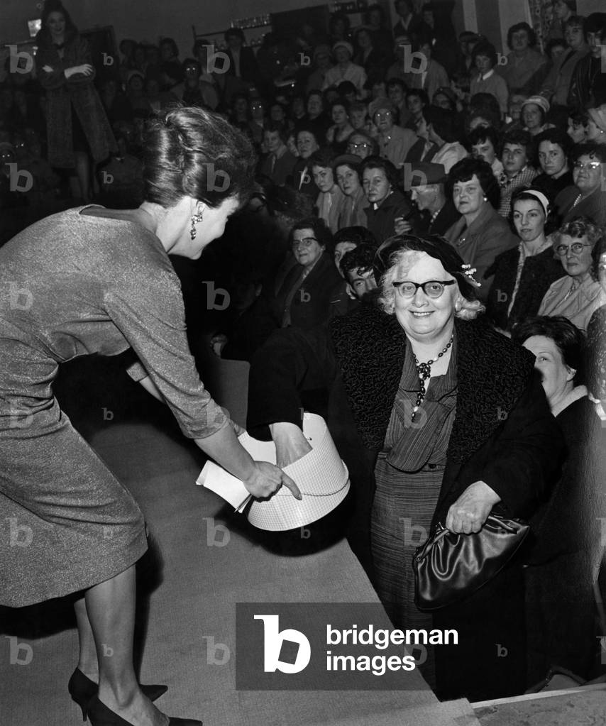 Mrs. Annie Pepperday, a miner's wife of Selston, Notts, asked us to put on a fashion show in her own village, using local girls as models, 18th November 1962 (b/w photo)