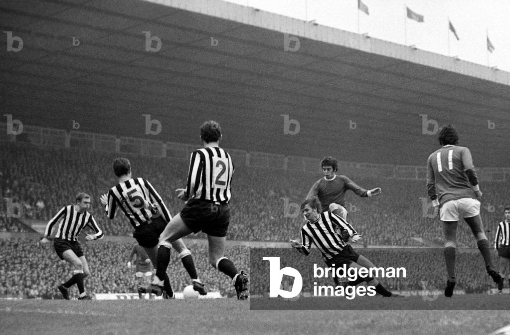 Manchester United's Willie Morgan takes on four Newcastle united defenders in a goal scoring attempt during their league match at old TraffordSeptember 1968 (photo)