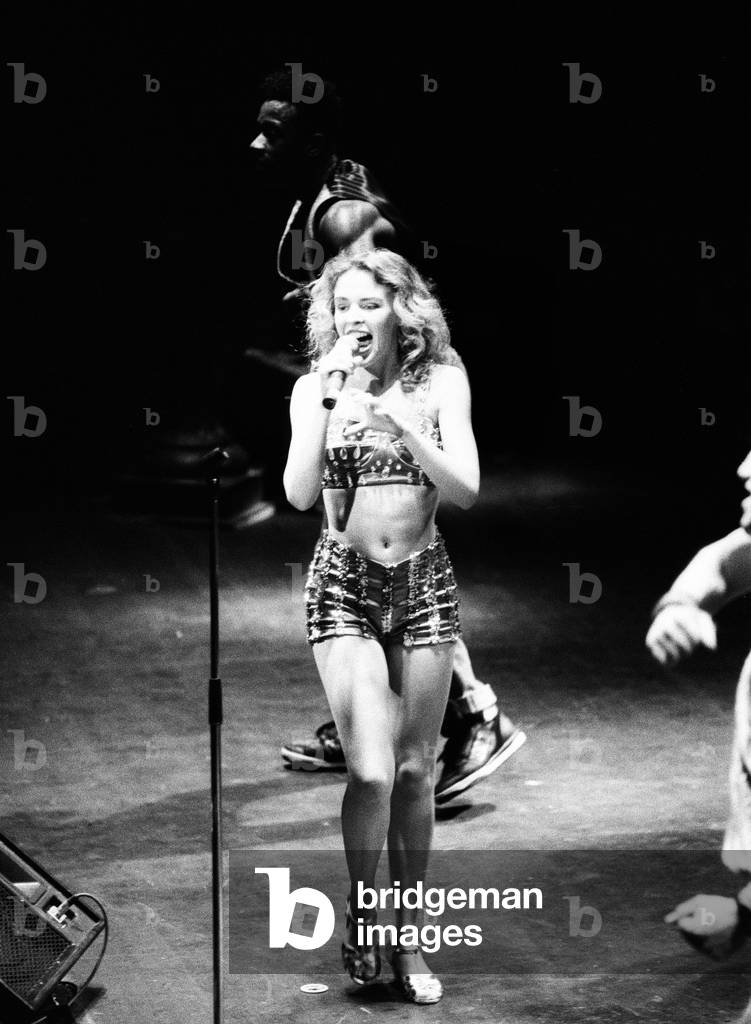 Kylie Minogue in concert at Liverpool Empire Theatre, Merseyside. 19th October 1989 (b/w photo)