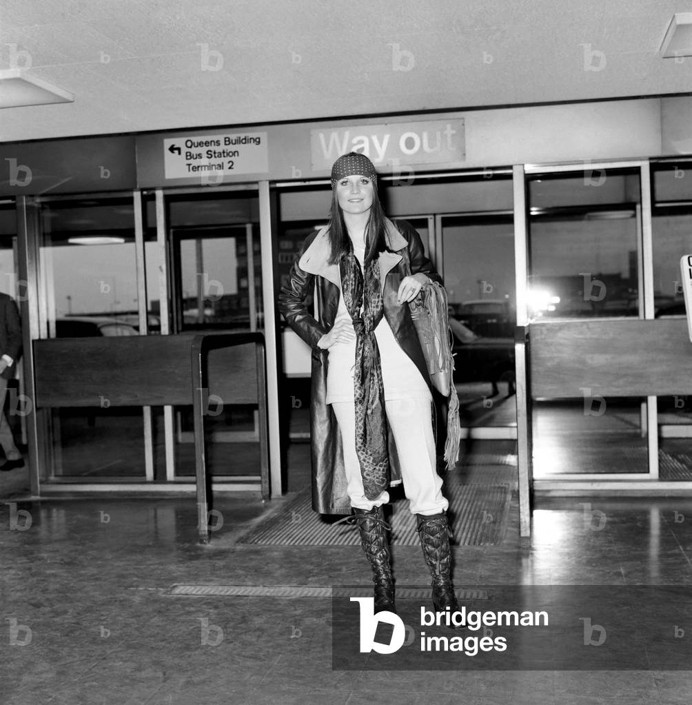 Entertainment. Music: Singer Sandie Shaw leaving London Airport for Madrid for a recording session. December 1969