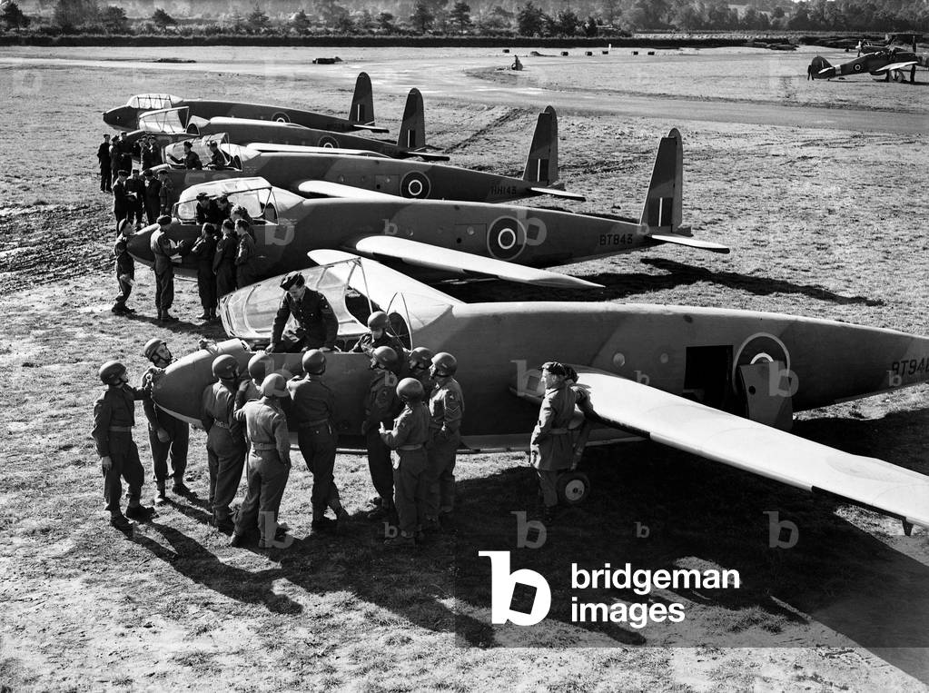 Soldier Pilot in the making of Gliders receiving instruction from R.A.F. instructor, October 1942 (b/w photo)