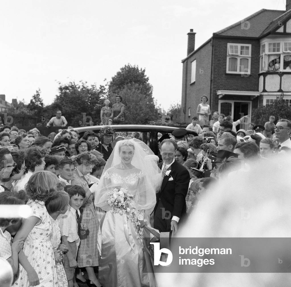 Shirley Eaton, TV and Film Actress aged 21, wedding to Colin Lenton Rowe aged 27, St Mary's, Kenton, Middlesex, Monday 5th August 1957 (b/w photo)