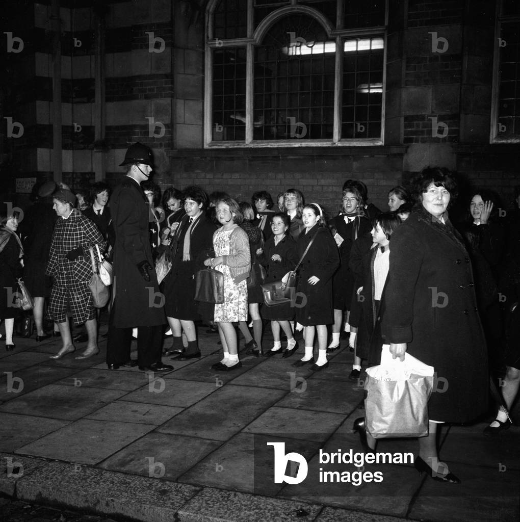 The Beatles play Wolverhampton. Fans queuing outside The Gaumont Cinema, 19 November 1963 (b/w photo)