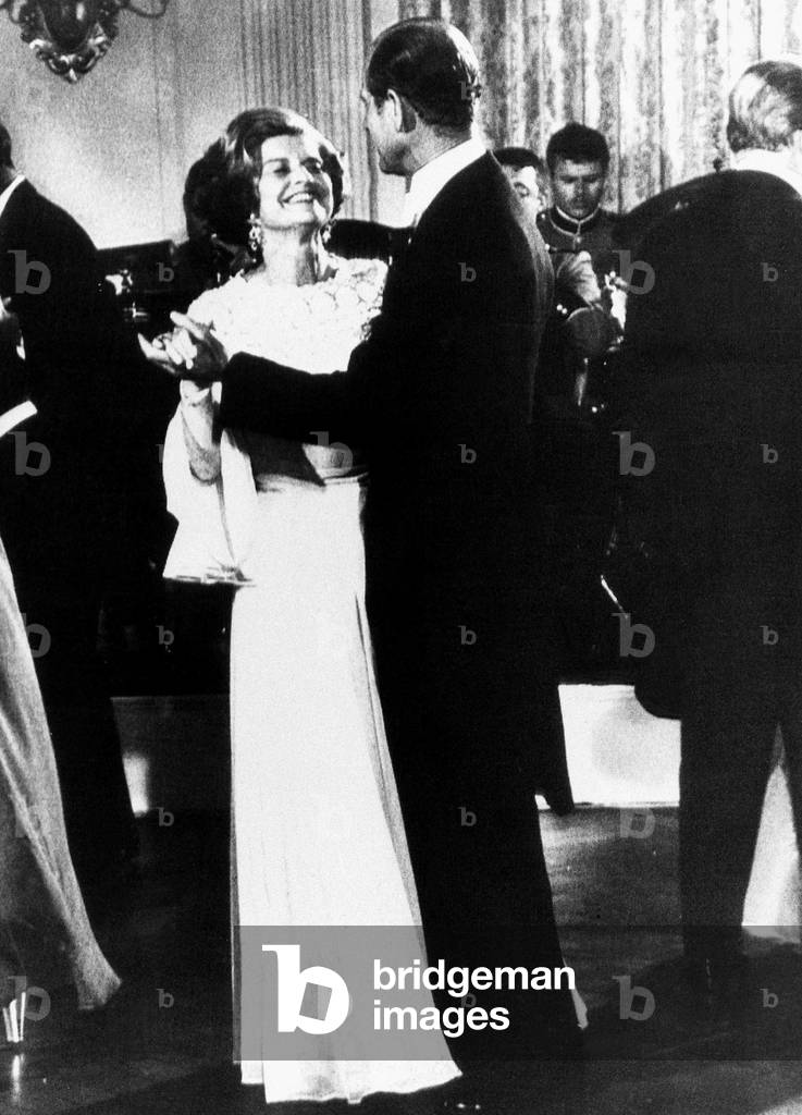 Prince Philip - Jul 1976
dances with Mrs Betty Ford at the White House banquet in Washington.