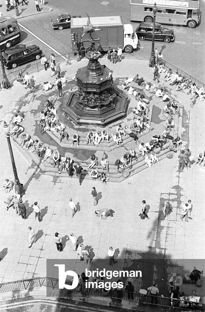 Tourists in Piccadilly, London, 10th August 1969 (b/w photo)