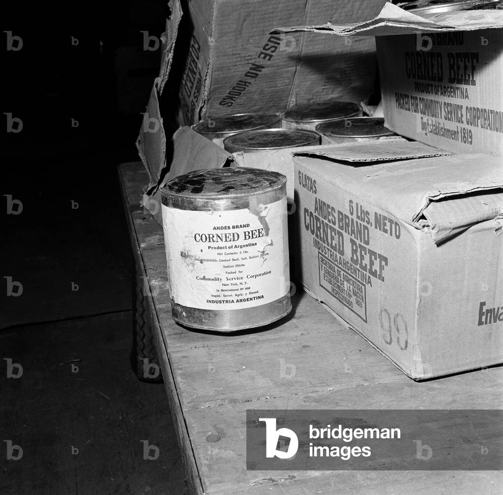 Typhoid outbreak. Aberdeen. Scotland. 1964. In 1964 there was an outbreak of typhoid in the city of Aberdeen, Scotland. The first two cases were identified on 20 May 1964; eventually over 400 cases were diagnosed and the patients were quarantined at the City Hospital in Urquhart Road, but no fatalities resulted. The outbreak was eventually traced to contaminated tinned corned beef from South America made by Fray Bentos and sold in the city's branch of the Scottish grocery chain William Low. The infected meat then contaminated a meat slicing machine within the William Low shop, leading to the spread of the disease. Pictured. Discarded Tins of corned beef from Argentina, 31st May 1964 (b/w photo)