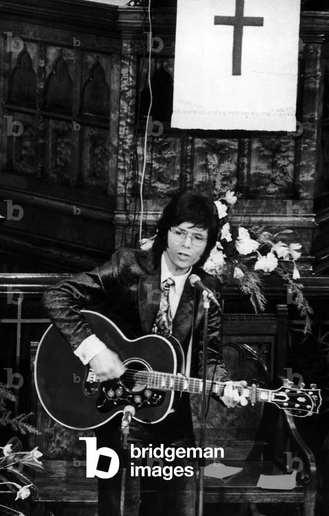 Cliff Richard seen here singing to the congregation at the Queen's Road Baptist Church, Coventry 7th March 1971 (b/w photo)