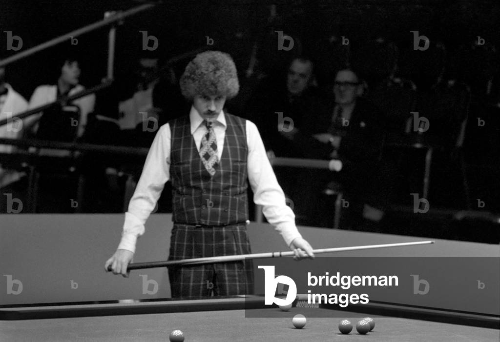 Canadian snooker player Cliff Thorburn in action during a tournament, 13th January 1975 (b/w photo)