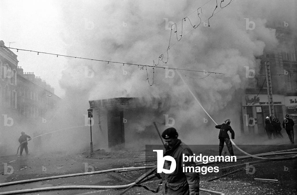 Shop at William-street in the Bogside area of Belfast is gutted by fire after being set alight during the disturbances.