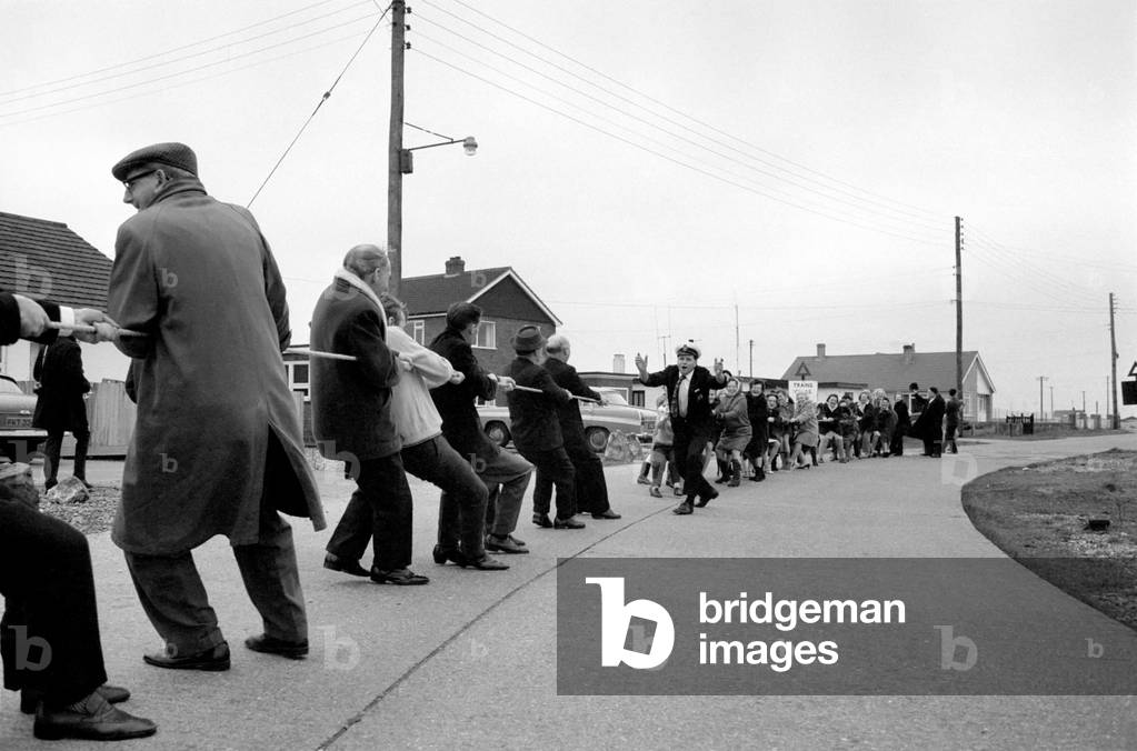 The annual Tug O' war battle of the sexes took place yesterday outside the Pilot Pub in Dungeness, December 1969
