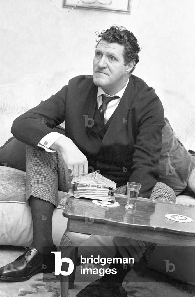 Tommy Cooper, pictured at home, January 1967.