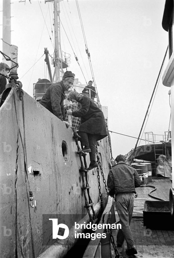 Radio London: Pirate Radio Station. General scene around the Motor Vessel Galaxy which is home to Radio London. Whilst the disc jockeys broadcast to the nation, the skipper ensures that they keep 12 miles off shore, the chef prepares a meal and the technicians ensure that equipment is working, 1965 (b/w photo)
