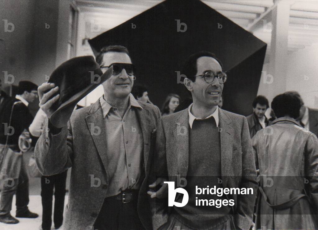 Emilio Tadini and Tullio Pericoli, at an Art Exhibition in Milan, Italy, 1983 (b/w photo)