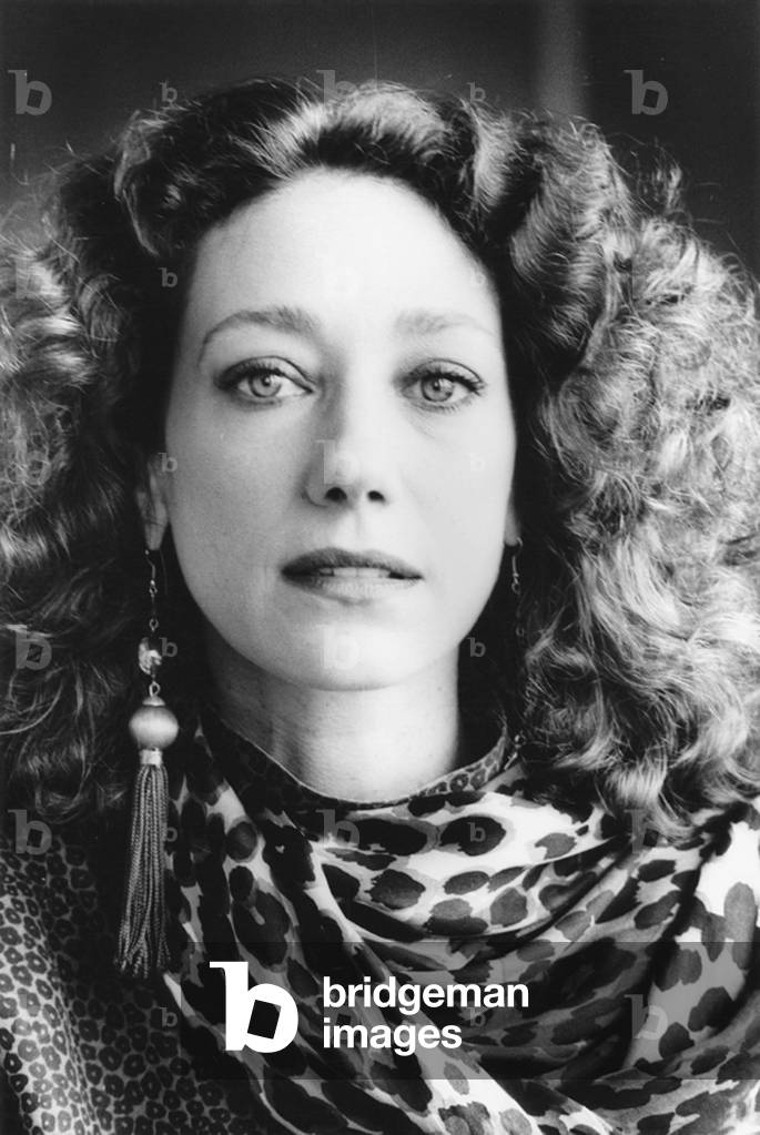 Marisa Berenson in Enrico Coveri's atelier Milan, Italy, 1984 (b/w photo)